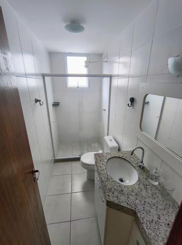 Et badeværelse på Residencial Prainha - apto 201