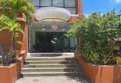 a building with stairs in front of a building at Lofts Mediterraneo in Barranquilla