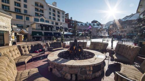 a fire pit in the middle of a city with chairs at 430 Cresta in Edwards