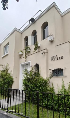 a white building with the word klein written on it at Lima Atelier Boutique in Lima