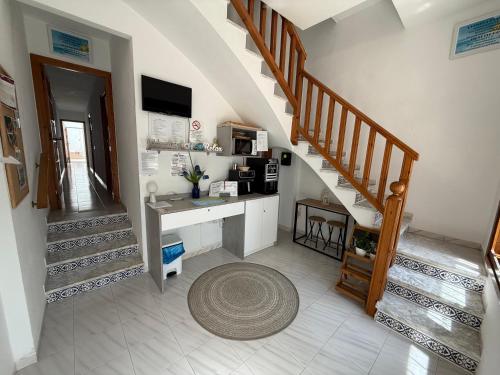TV a/nebo společenská místnost v ubytování Hostal RENCH