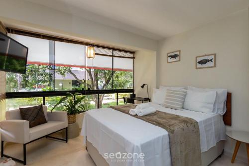 Ένα ή περισσότερα κρεβάτια σε δωμάτιο στο Studio Próximo ao Parque em Asa Norte - SCE114