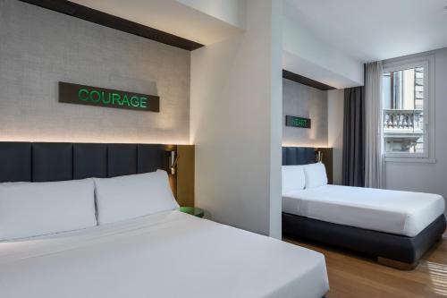 Katil atau katil-katil dalam bilik di The Market Urban Hotel