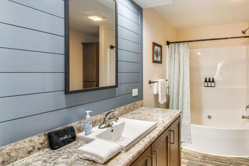 a bathroom with a sink and a shower at Fairplay Family Cabin on 2 and Acres! 25-0283 in Fairplay