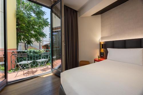 Katil atau katil-katil dalam bilik di The Market Urban Hotel