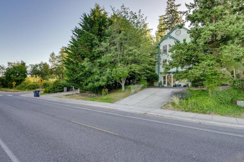 a house on the side of a road next to a street at Less Than 1 Mi to Jefferson Healthcare Nurse-Ready Rental in Port Townsend