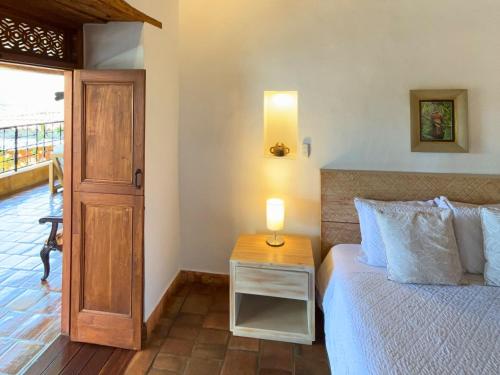 Кровать или кровати в номере Santa Sofia Casa Boutique