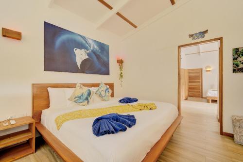 Postel nebo postele na pokoji v ubytování SIREN SANCTUARY Resort