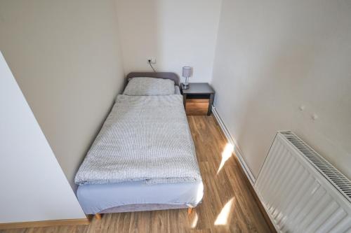 Cama o camas de una habitación en Hornický hostinec Hodůnka