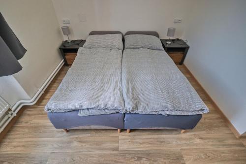 Cama o camas de una habitación en Hornický hostinec Hodůnka