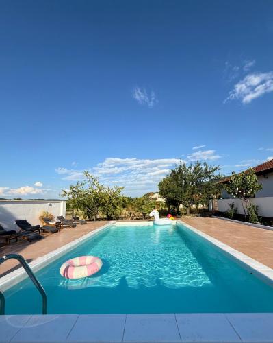a swimming pool with a swimming pool at House Milovanovic in Soko Banja