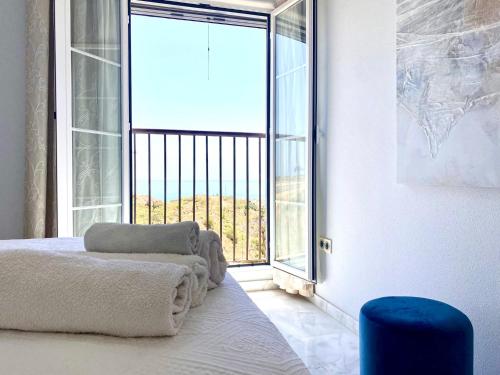 Ένα ή περισσότερα κρεβάτια σε δωμάτιο στο La Cala Sun Apartment