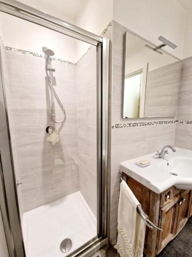 a bathroom with a shower and a sink at Ca' MaEle in Cattolica