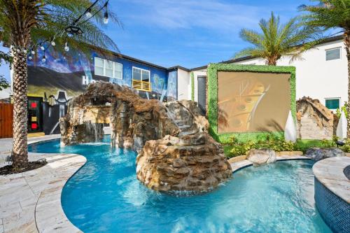 a pool with a water slide in a house at 1021 Fantasy in Davenport