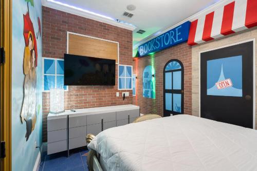 a bedroom with a large bed and a brick wall at 1021 Fantasy in Davenport