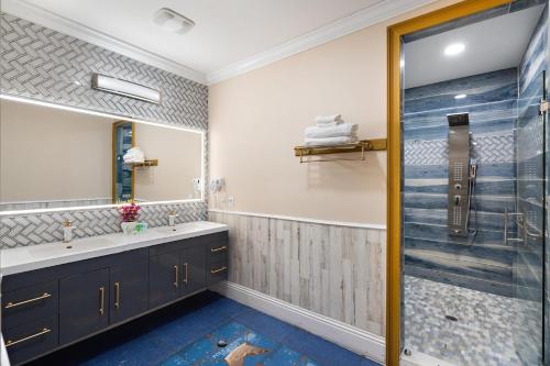 a bathroom with a sink and a shower at 1021 Fantasy in Davenport
