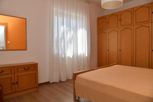 Cama o camas de una habitación en B apartment with terrace 1 min walk to the beach