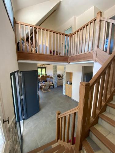 a view from the top of a house with stairs at La maison normande in Rots