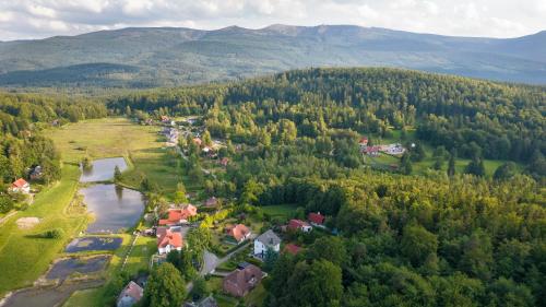 an aerial view of a village in the mountains at Heart of Polen appartements in Piechowice