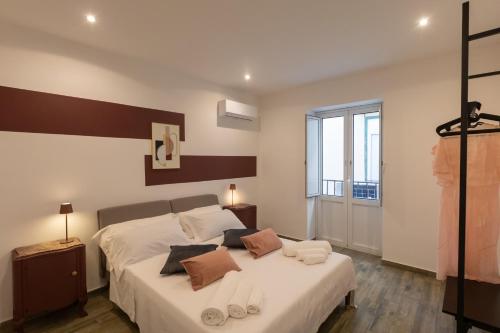 Ένα ή περισσότερα κρεβάτια σε δωμάτιο στο Aromarìa Palace