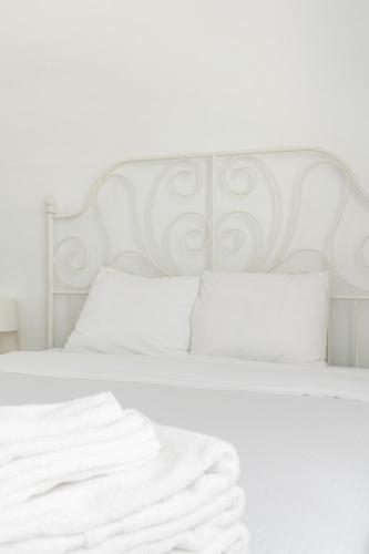 Ένα ή περισσότερα κρεβάτια σε δωμάτιο στο Ideal 4BR2BA Home for Family Vacations