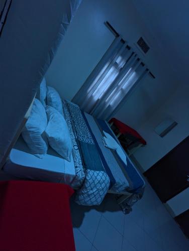 Кровать или кровати в номере JACARANDA HOMESTAY