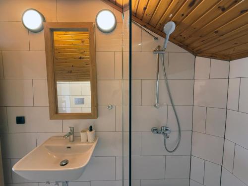 a bathroom with a sink and a shower at Casa Vagabundo Boutique Hotel - Adults Only in Alanya