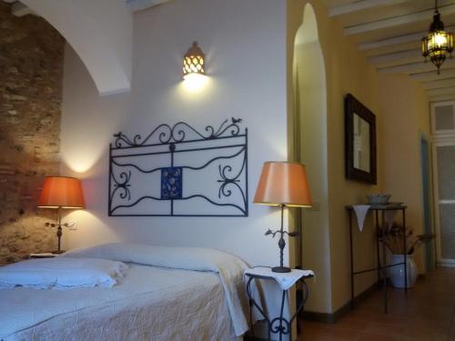 Ένα ή περισσότερα κρεβάτια σε δωμάτιο στο Marulivo Hotel