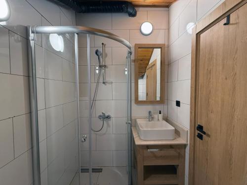 a bathroom with a sink and a shower at Casa Vagabundo Boutique Hotel - Adults Only in Alanya