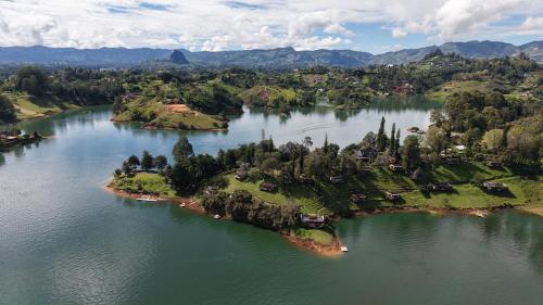 an aerial view of an island in a lake at La Pausa Hotelbistro in Guatapé