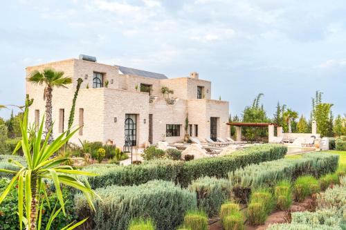 Κήπος έξω από το Villa Bismelah