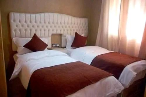 Postel nebo postele na pokoji v ubytování Bivouac Camel Trips