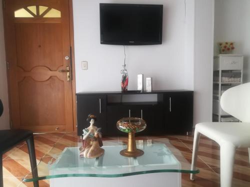 Μια τηλεόραση ή/και κέντρο ψυχαγωγίας στο Apartamento Familiar Fantástico!!! en Sabaneta