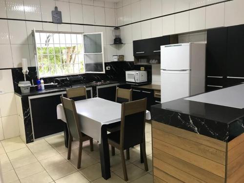 Η κουζίνα ή μικρή κουζίνα στο Casa Aconchego