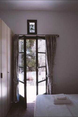 Кровать или кровати в номере - Kioupi - 2 bedroom elegant and stylish house
