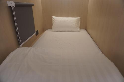 Cama o camas de una habitación en NapzBox