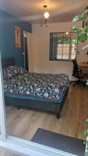 Postel nebo postele na pokoji v ubytování Maison Triplex
