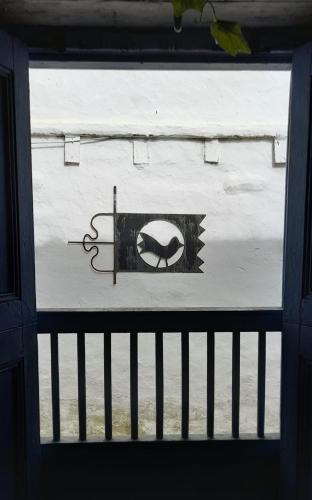 a view from a window of a building with a sign at Casa Bakero in Barichara