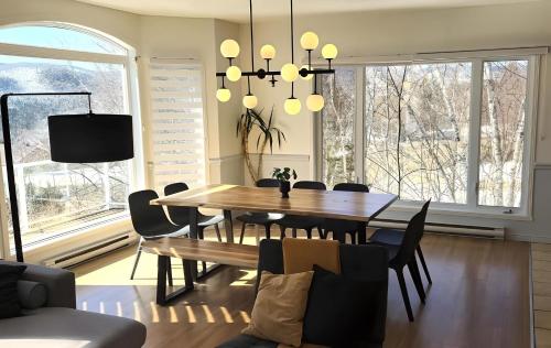 Μια τηλεόραση ή/και κέντρο ψυχαγωγίας στο Bleuzen appartement du bas vue sur fleuve , Spa, WOW