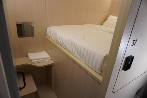 Cama o camas de una habitación en NapzBox