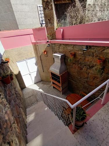 an overhead view of a balcony with a heater on a building at Apartamento Brañas in Cambados
