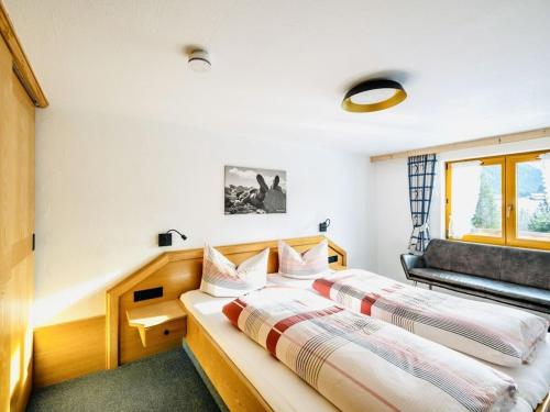 Giường trong phòng chung tại Holiday apartment with 2 bedrooms