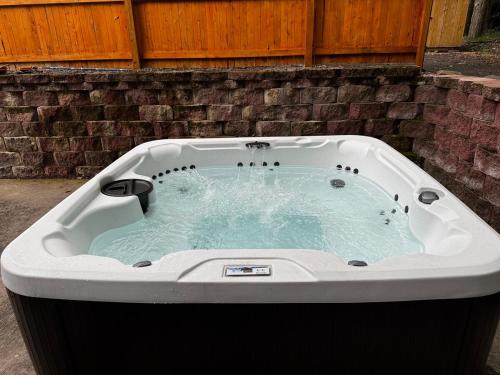 a jacuzziificialificialificialificialificialificialificialificialificialificialificial at Italy Inspired Lakeview Chalet with Hot Tub in Lake Harmony