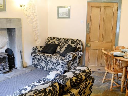 Et opholdsområde på Langcliffe Lock Cottage