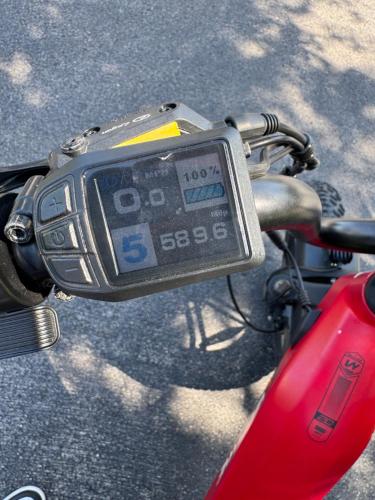a clock on the side of a red motorcycle at Dania Beach Unit 1 By Pmi in Dania Beach