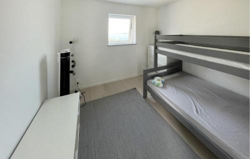 Beach Front Home In Åkersberga With Saunaにあるベッド