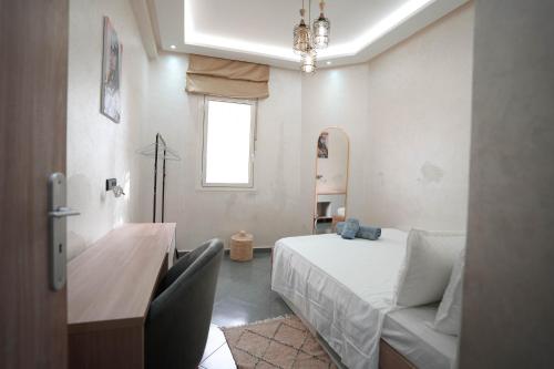 Ένα ή περισσότερα κρεβάτια σε δωμάτιο στο Dar lalla