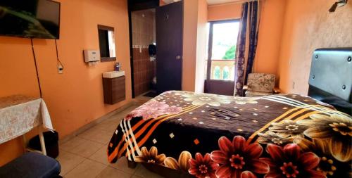 Ένα ή περισσότερα κρεβάτια σε δωμάτιο στο Hotel El Eden 2 personas 11