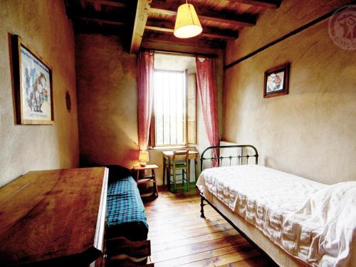 Postel nebo postele na pokoji v ubytování Gîte historique avec piscine, WiFi, animaux acceptés - FR-1-496-26