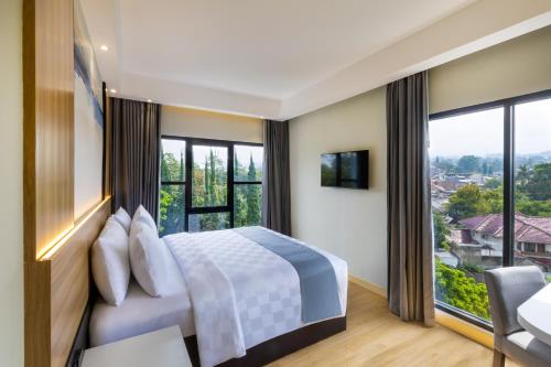 Кровать или кровати в номере Best Western Setiabudhi Bandung